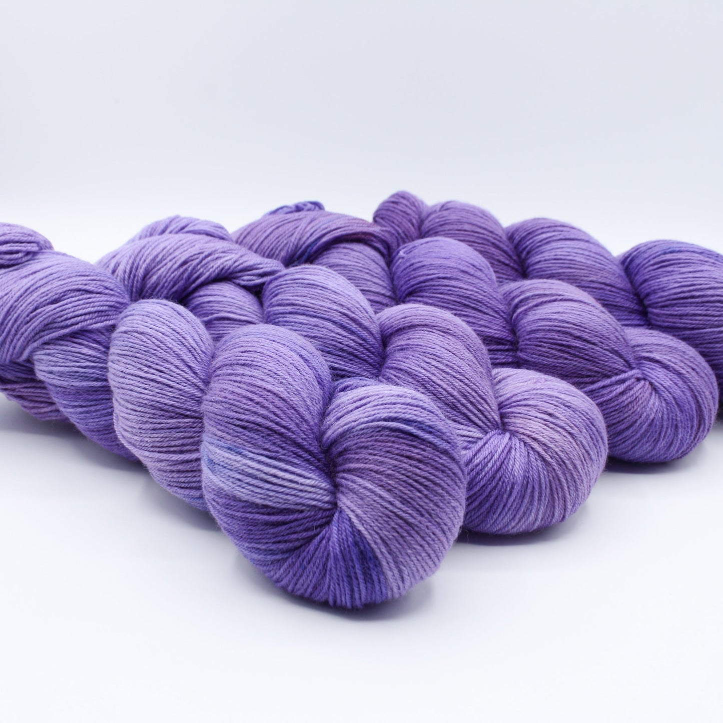 Quiet Amethyst hand dyed yarn by A Splash Of Fiber — artisan fiber and handmade creations