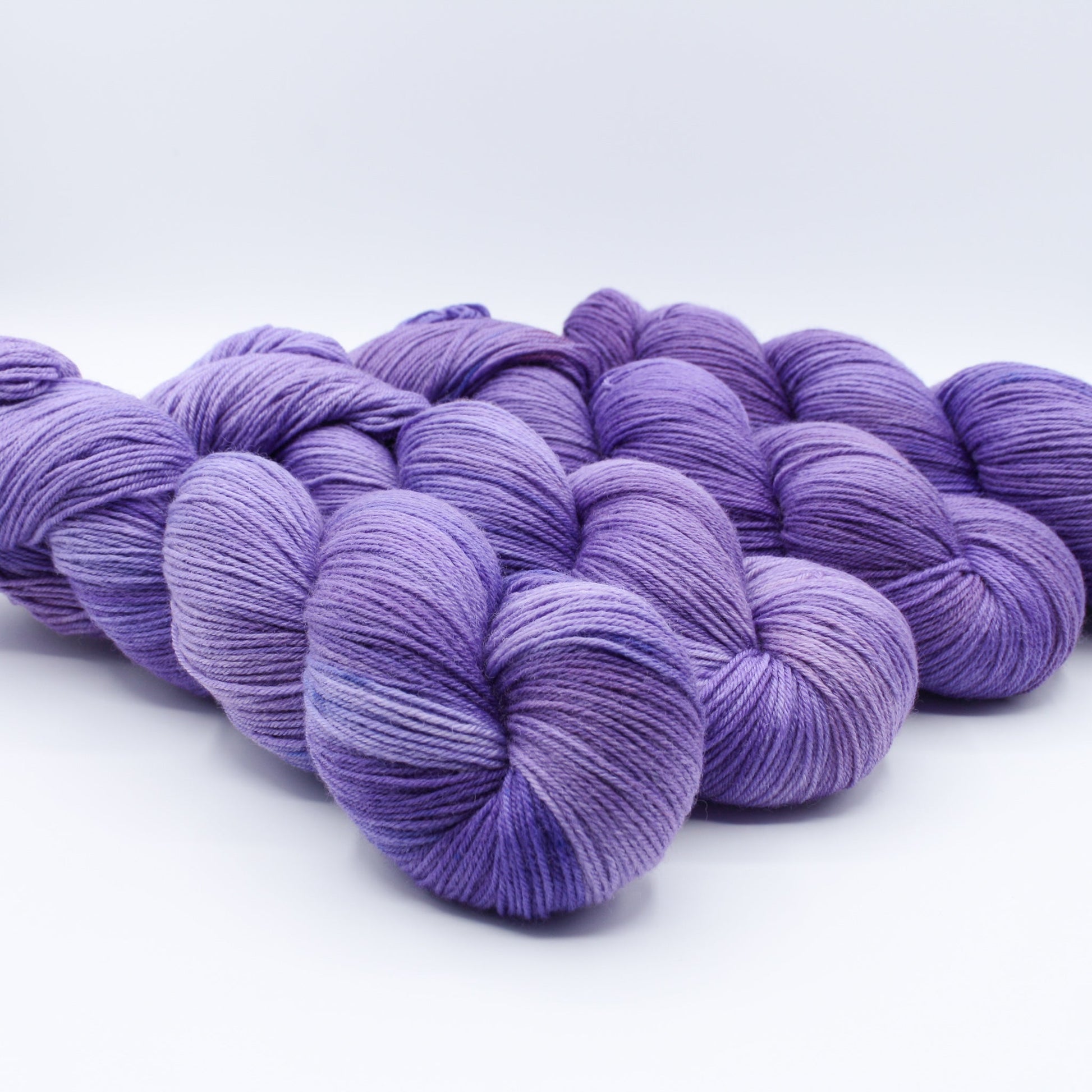 Quiet Amethyst hand dyed yarn by A Splash Of Fiber — artisan fiber and handmade creations