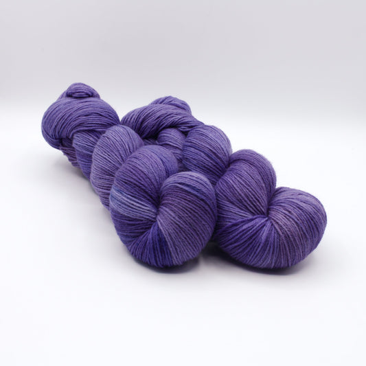 Quiet Amethyst hand dyed yarn by A Splash Of Fiber — artisan fiber and handmade creations